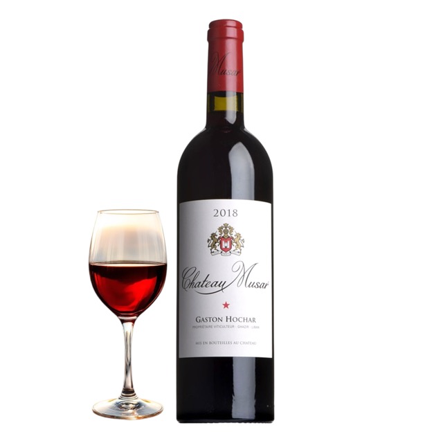 Bottle and glass of Chateau Musar red wine